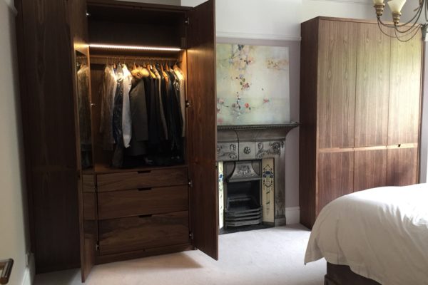 Wide view of room with wardrobes